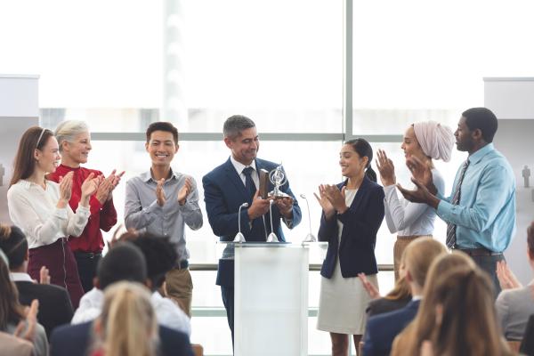 An award being presented to a business person